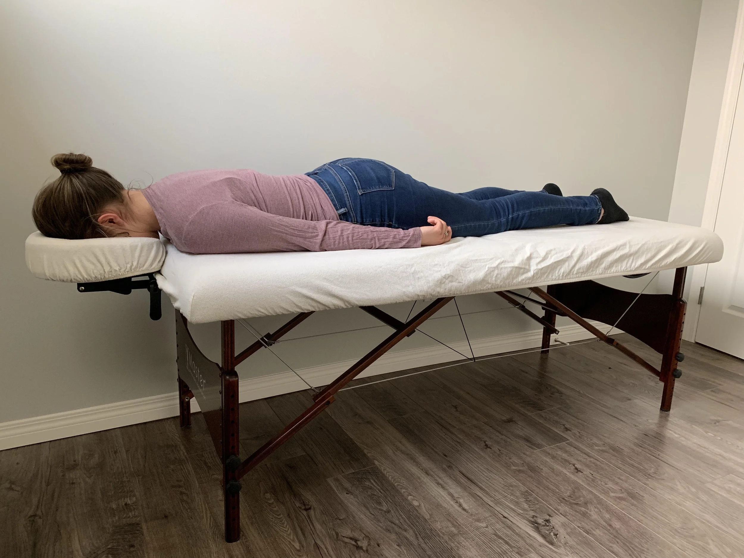 Patient resting on Vitrectomy Healing’s face down recovery bed